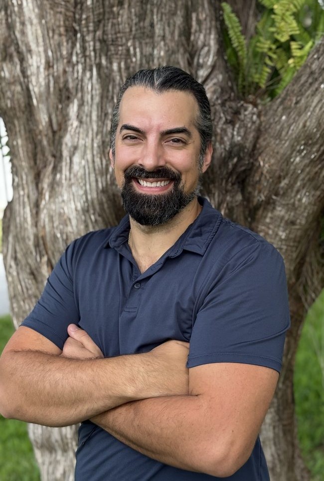 Alex Messier LMT NMT MMP CNST — clinical massage therapist and neurosomatic specialist at Cotee River Massage & Skincare in Port Richey FL